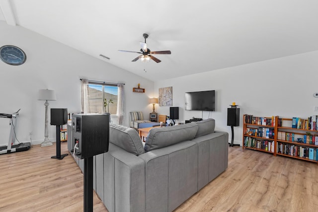 1390 Tule Peak Cir, Carson City, NV 89701 - living area featuring a ceiling fan, lofted ceiling, light wood-type flooring, and baseboards