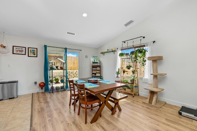 1390 Tule Peak Cir, Carson City, NV 89701 - dining space featuring plenty of natural light, light wood-style flooring, baseboards, vaulted ceiling, and recessed lighting