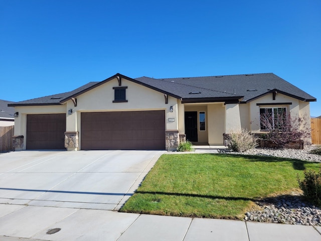 1390 Tule Peak Cir, Carson City, NV 89701 - view of front of house featuring an attached garage, stucco siding, driveway, and stone siding
