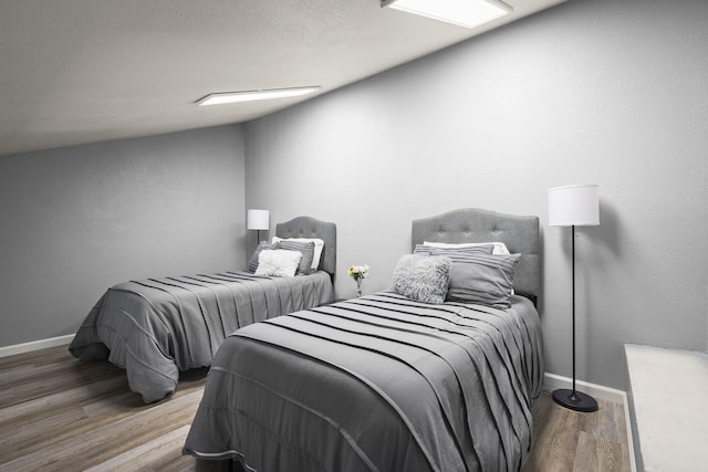 2107 G St, Sparks, NV 89431 - bedroom featuring wood finished floors and baseboards