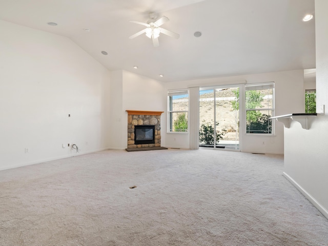 570 Buckskin Dr, Fernley, NV 89408 - unfurnished living room featuring lofted ceiling, a fireplace, carpet, baseboards, and a ceiling fan