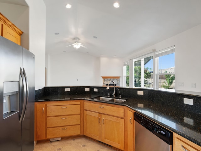 570 Buckskin Dr, Fernley, NV 89408 - kitchen featuring appliances with stainless steel finishes, a sink, dark stone counters, ceiling fan, and recessed lighting