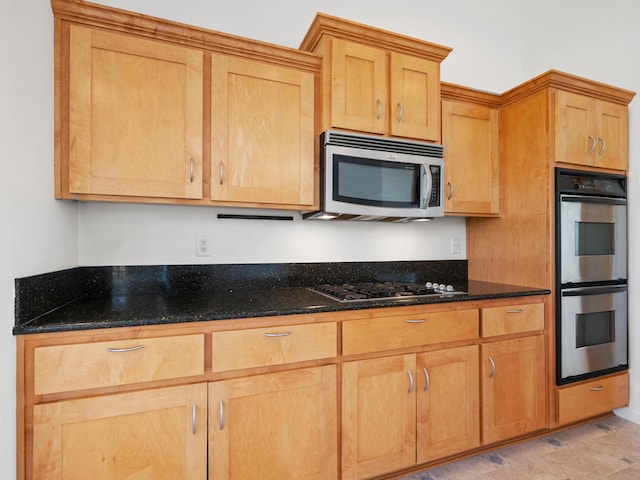 570 Buckskin Dr, Fernley, NV 89408 - kitchen featuring stainless steel appliances and dark stone counters