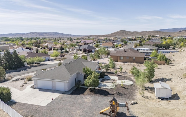 570 Buckskin Dr, Fernley, NV 89408 - aerial view of residential area featuring a mountain backdrop