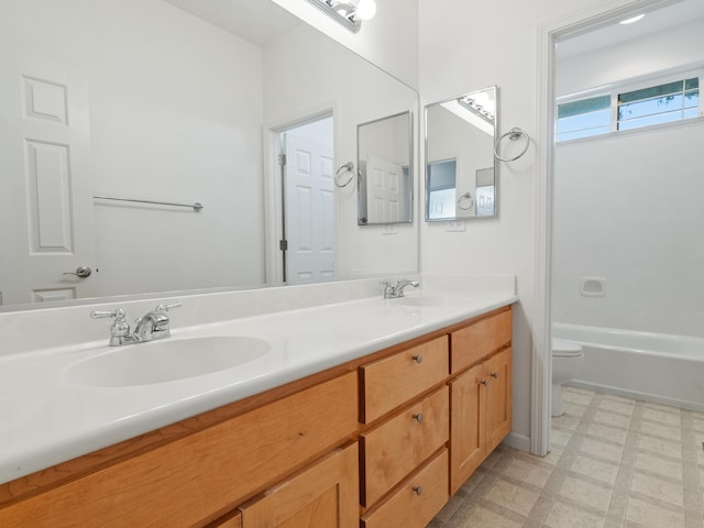 570 Buckskin Dr, Fernley, NV 89408 - bathroom featuring toilet, tile patterned floors, and double vanity