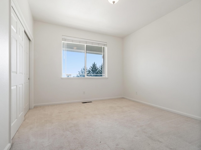 570 Buckskin Dr, Fernley, NV 89408 - unfurnished bedroom with carpet, a closet, and baseboards