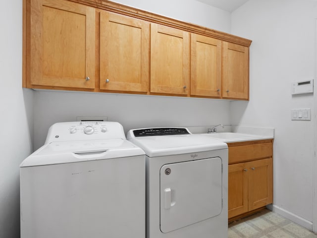 570 Buckskin Dr, Fernley, NV 89408 - clothes washing area with cabinet space, washer and clothes dryer, light floors, and baseboards