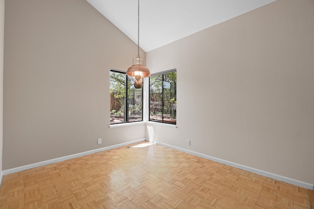 1043 Shenandoah Dr, Carson City, NV 89702 - spare room with baseboards and high vaulted ceiling