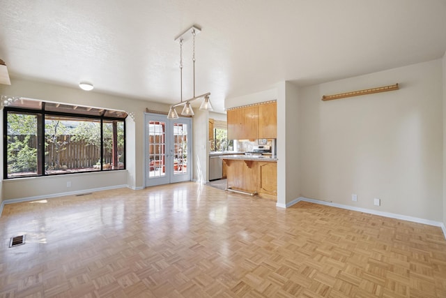 1043 Shenandoah Dr, Carson City, NV 89702 - unfurnished living room with baseboards