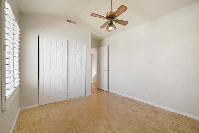 1043 Shenandoah Dr, Carson City, NV 89702 - unfurnished bedroom featuring baseboards, vaulted ceiling, a closet, and ceiling fan