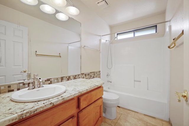1043 Shenandoah Dr, Carson City, NV 89702 - full bathroom featuring toilet, shower / tub combination, vanity, and tile patterned flooring