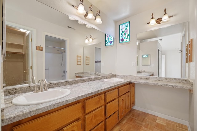1043 Shenandoah Dr, Carson City, NV 89702 - bathroom featuring double vanity and a shower