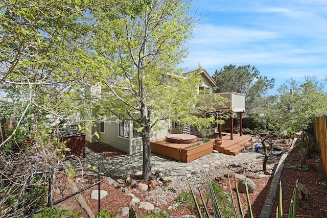 1043 Shenandoah Dr, Carson City, NV 89702 - fenced backyard with a wooden deck and a patio