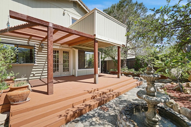 1043 Shenandoah Dr, Carson City, NV 89702 - wooden terrace with french doors, fence, and a pergola
