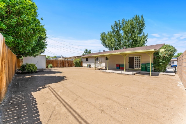 2580 Pequop St, Reno, NV 89512 - back of property with a patio area and a fenced backyard