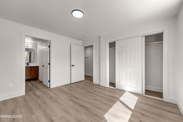 1717 Rio Tinto Dr, Sparks, NV 89434 - unfurnished bedroom with light wood-style flooring, a closet, baseboards, and ensuite bath
