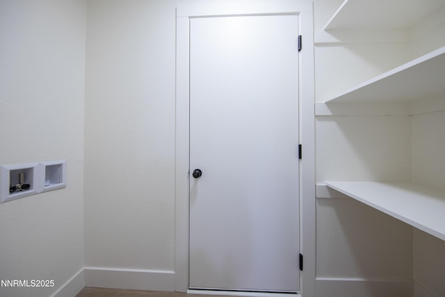 1717 Rio Tinto Dr, Sparks, NV 89434 - laundry area featuring washer hookup and baseboards