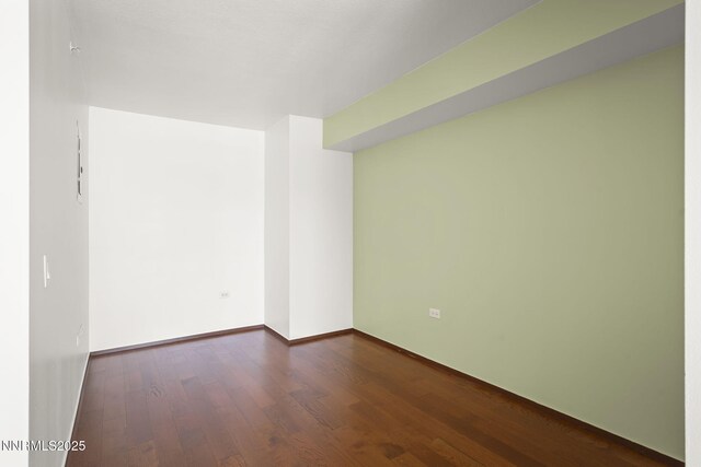 255 N Sierra St Unit 1419, Reno, NV 89501 - empty room featuring wood finished floors and baseboards