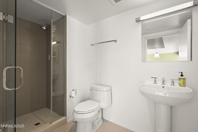 255 N Sierra St Unit 1419, Reno, NV 89501 - full bath featuring toilet, tile patterned floors, a shower stall, and baseboards