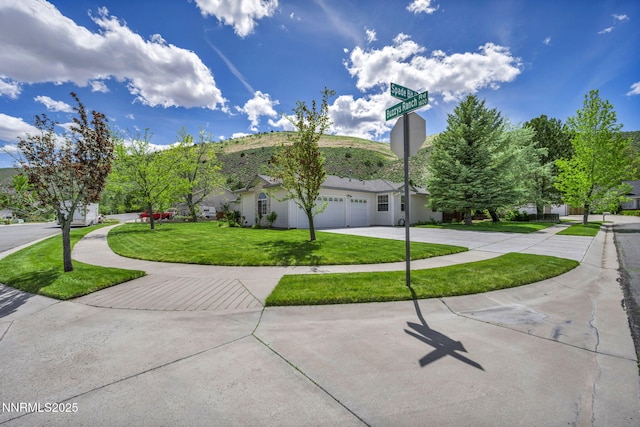 1634 Buzzys Ranch Rd, Carson City, NV 89701 - view of front facade with driveway, a front yard, and a garage