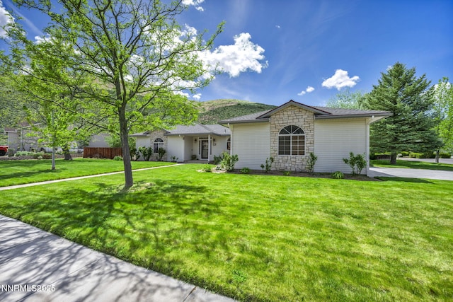 1634 Buzzys Ranch Rd, Carson City, NV 89701 - view of front facade featuring stone siding and a front yard