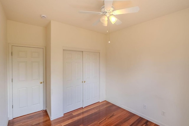 2413 San Remo Dr, Sparks, NV 89434 - unfurnished bedroom with wood finished floors, a closet, baseboards, and ceiling fan