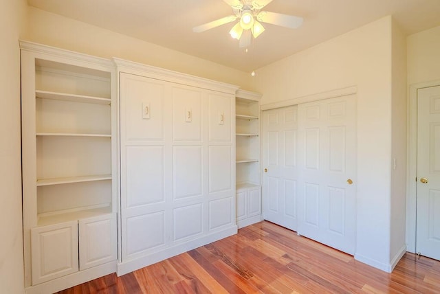2413 San Remo Dr, Sparks, NV 89434 - unfurnished bedroom with wood finished floors, ceiling fan, and a closet