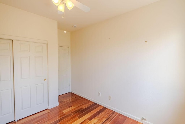 2413 San Remo Dr, Sparks, NV 89434 - unfurnished bedroom with light wood finished floors, a closet, baseboards, and a ceiling fan