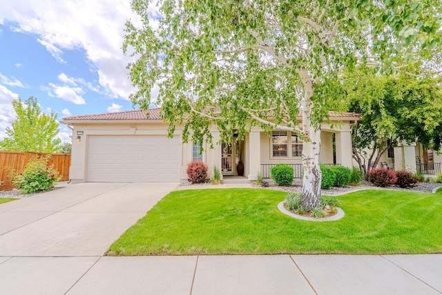2413 San Remo Dr, Sparks, NV 89434 - view of front of house with driveway, a tiled roof, stucco siding, and a garage