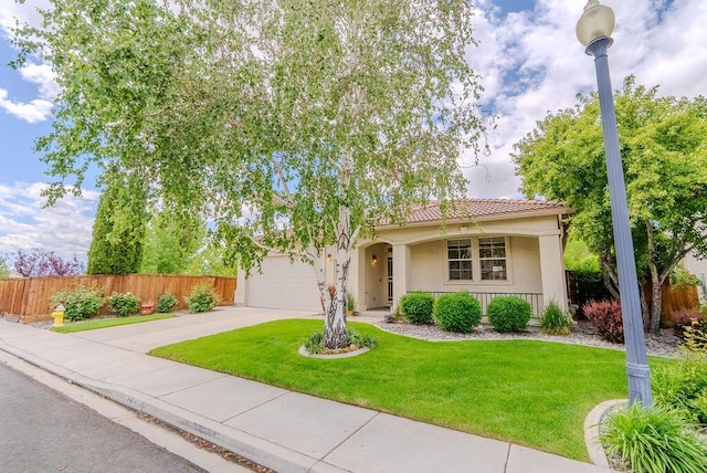 2413 San Remo Dr, Sparks, NV 89434 - view of front of home featuring a tile roof, concrete driveway, stucco siding, and a garage