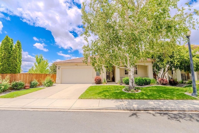 2413 San Remo Dr, Sparks, NV 89434 - view of front of house with an attached garage, driveway, stucco siding, and a tile roof