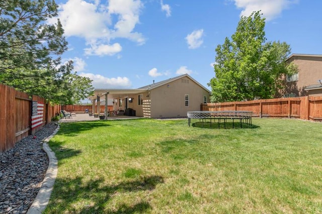 5470 Weatherby Ct, Reno, NV 89523 - view of yard with a patio and a trampoline