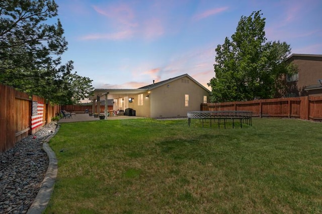 5470 Weatherby Ct, Reno, NV 89523 - yard at dusk featuring a patio