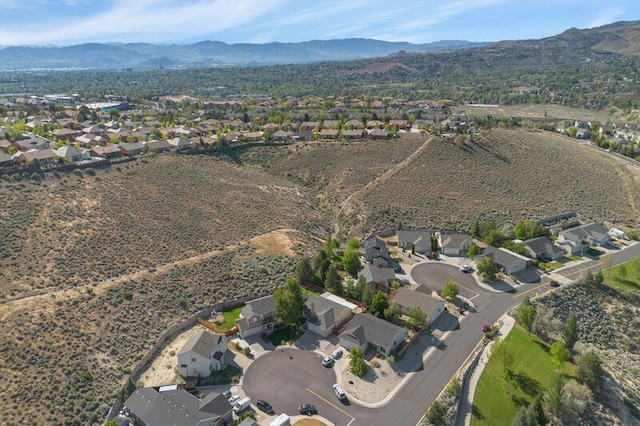 5470 Weatherby Ct, Reno, NV 89523 - aerial view of property and surrounding area featuring a mountainous background and nearby suburban area
