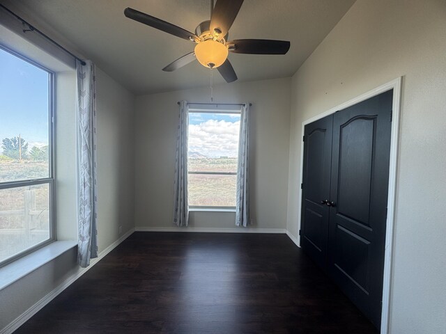 9485 Zaring Ave, Winnemucca, NV 89445 - unfurnished bedroom with wood finished floors and a ceiling fan
