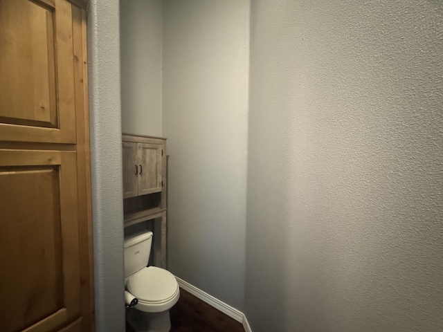 9485 Zaring Ave, Winnemucca, NV 89445 - bathroom with toilet and baseboards