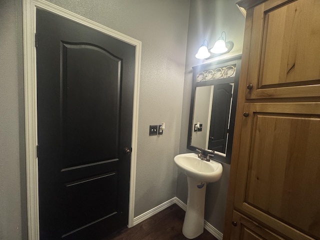 9485 Zaring Ave, Winnemucca, NV 89445 - bathroom with wood finished floors and baseboards