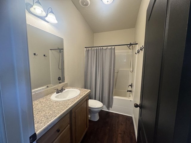 9485 Zaring Ave, Winnemucca, NV 89445 - bathroom featuring wood finished floors, shower / tub combo, and vanity