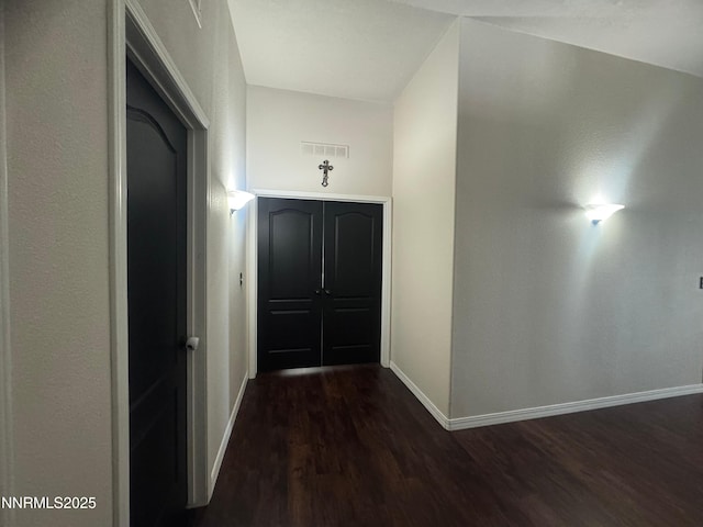 9485 Zaring Ave, Winnemucca, NV 89445 - hall featuring dark wood-style flooring and baseboards