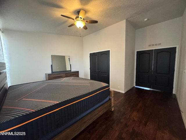 9485 Zaring Ave, Winnemucca, NV 89445 - bedroom with wood finished floors, a closet, and a ceiling fan