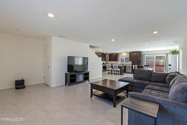 8944 Elk Ravine Dr, Reno, NV 89506 - living room featuring baseboards and recessed lighting