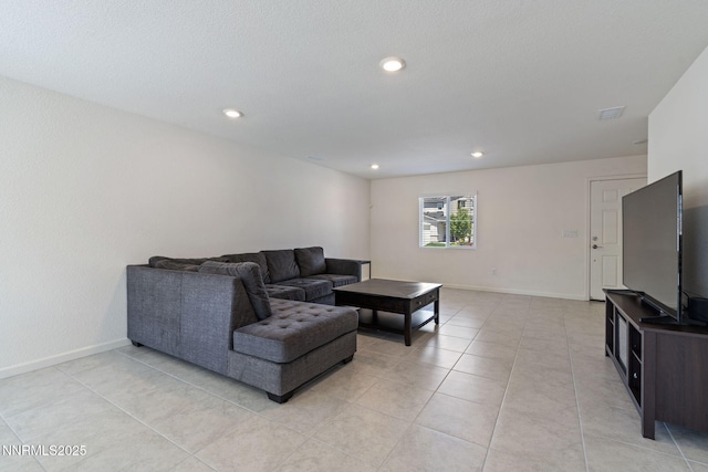 8944 Elk Ravine Dr, Reno, NV 89506 - living area with light tile patterned floors, recessed lighting, and baseboards