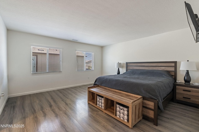 8944 Elk Ravine Dr, Reno, NV 89506 - bedroom featuring wood finished floors and baseboards
