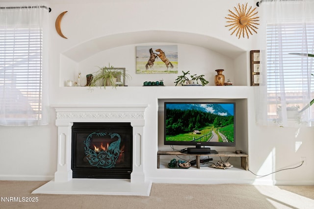 1501 Riverpark Pkwy, Dayton, NV 89403 - living area with carpet floors, plenty of natural light, and a lit fireplace