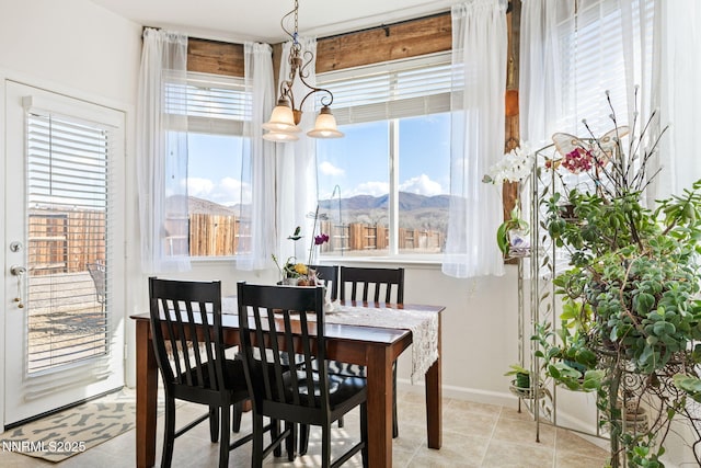 1501 Riverpark Pkwy, Dayton, NV 89403 - dining space featuring healthy amount of natural light, baseboards, and a mountain view
