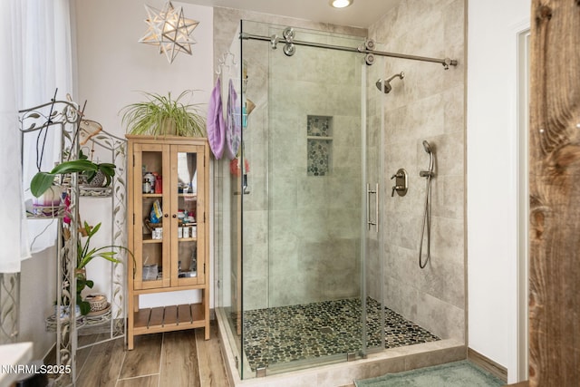 1501 Riverpark Pkwy, Dayton, NV 89403 - bathroom with a stall shower, wood finished floors, and recessed lighting