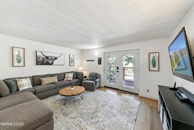 275 Tramway Dr Unit C, Stateline, NV 89449 - living area featuring wood finished floors, french doors, baseboards, and ornamental molding