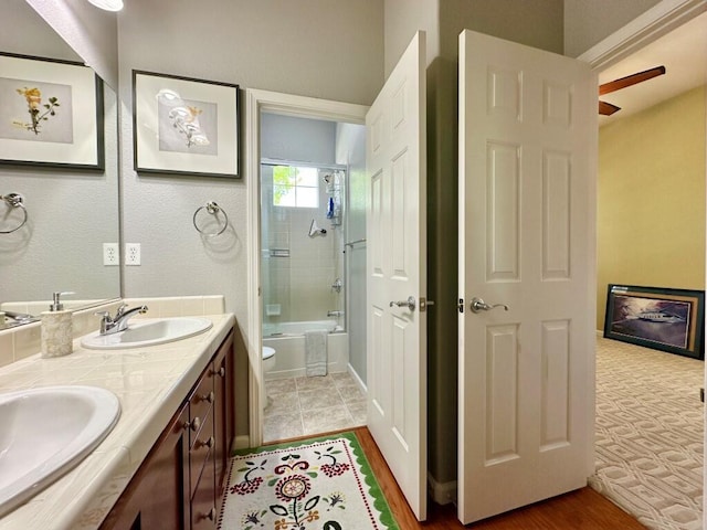 10555 Hampton Creek Dr, Reno, NV 89521 - full bath featuring double vanity, toilet, and tub / shower combination