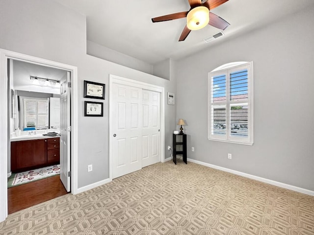 10555 Hampton Creek Dr, Reno, NV 89521 - unfurnished bedroom featuring baseboards, ensuite bathroom, a closet, and ceiling fan