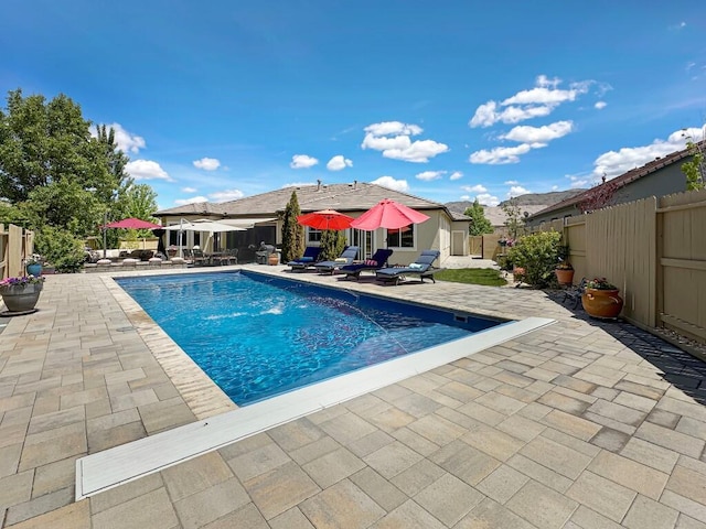 10555 Hampton Creek Dr, Reno, NV 89521 - view of swimming pool featuring a patio area and a fenced backyard